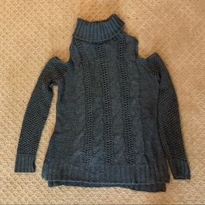 Knitted turtleneck open shoulder sweater